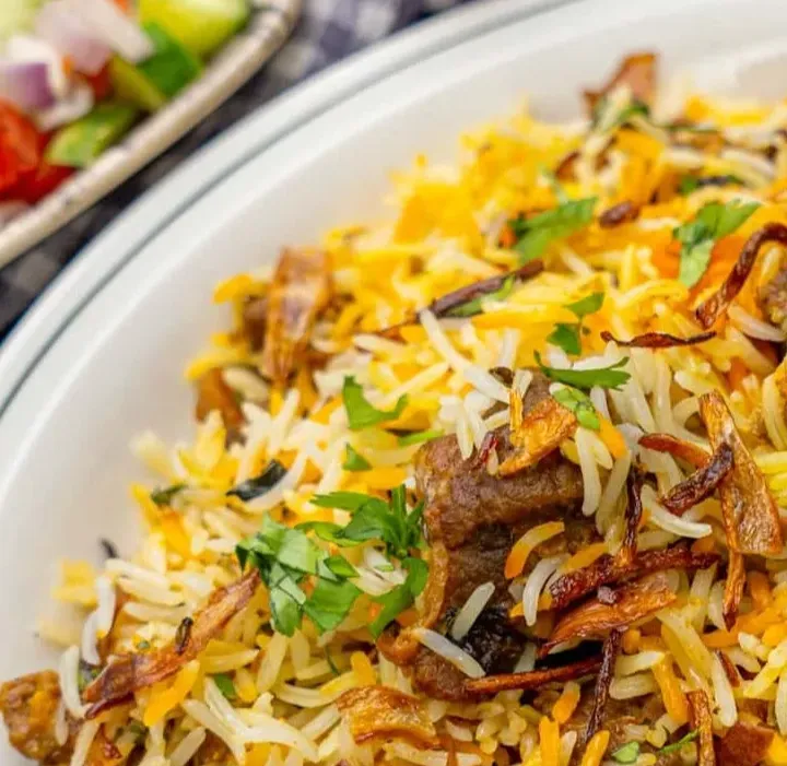 Lamb biryani with basmati rice at Chef Paaji — best biryani in Winnipeg