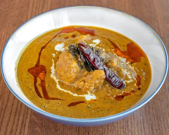 Aromatic bone-in Chicken Biryani at Chef Paaji - best biryani in Winnipeg